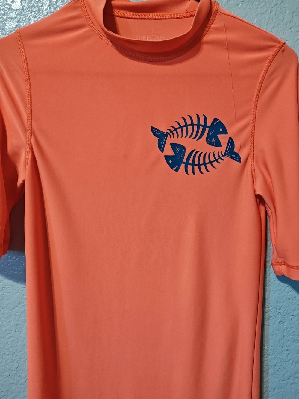 Cherokee Orange Short-Sleeve Swim Top with Navy Fishbone Graphic